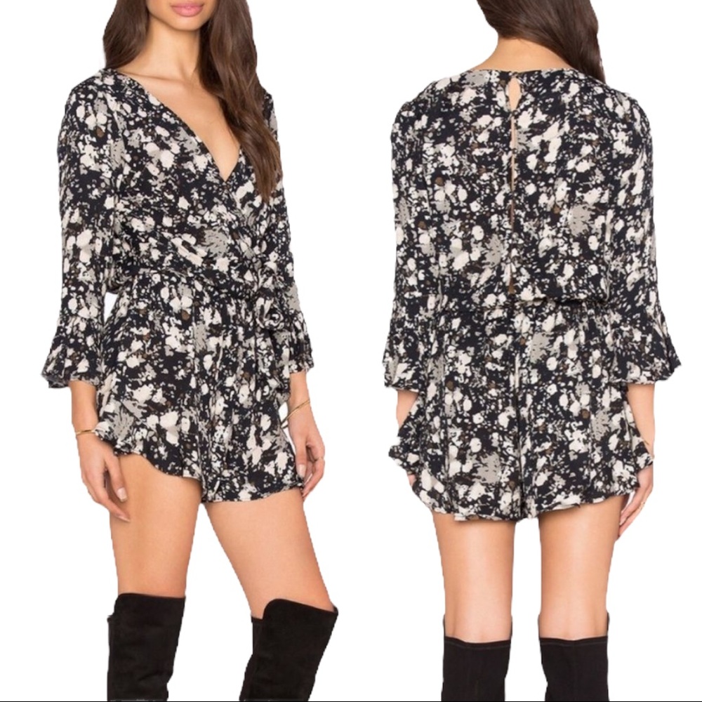 FREE‎ PEOPLE All The Right Ruffles Romper in Black Raven Combo. Size Small